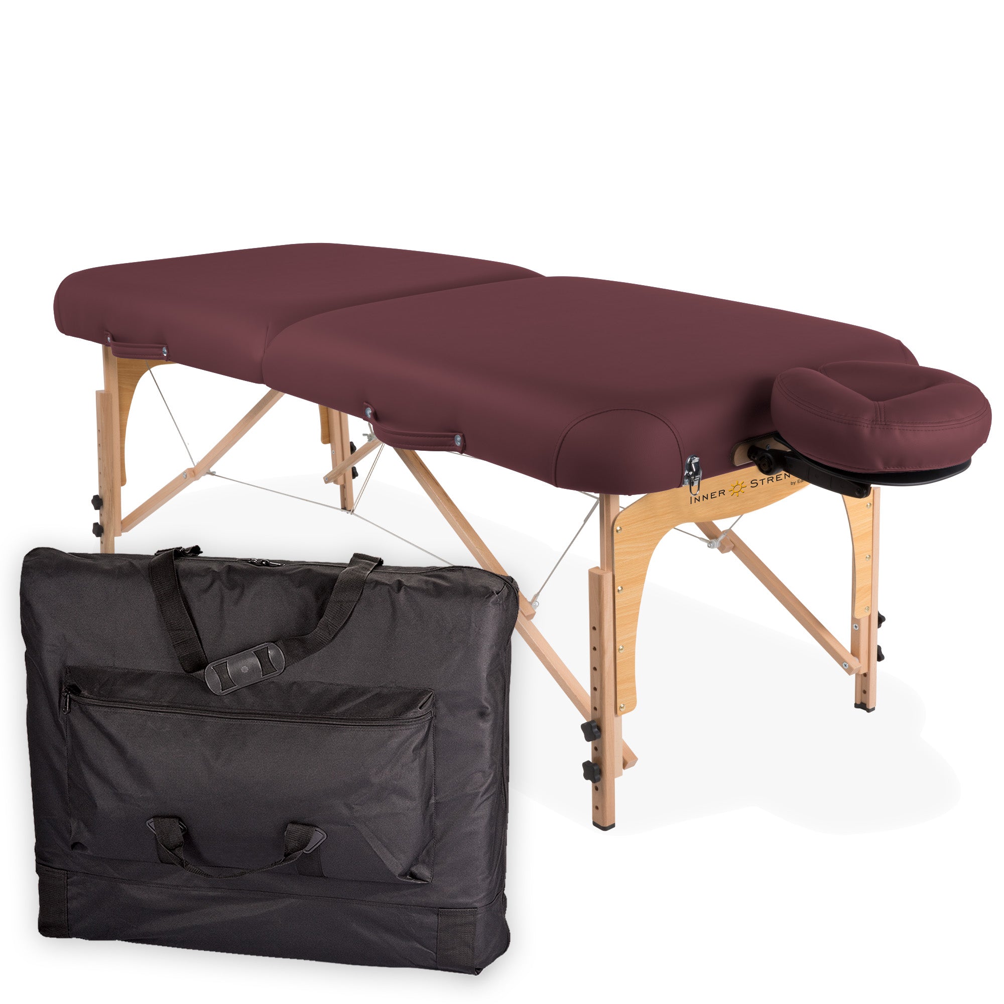 Inner Strength E2 portable massage table with triple cushioning and black carrying case.
