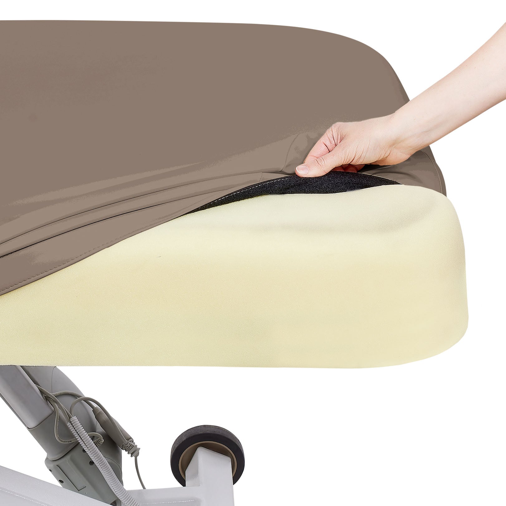 A hand lifts an EarthLite ELLORA LX FLAT cover to reveal memory foam cushioning underneath.