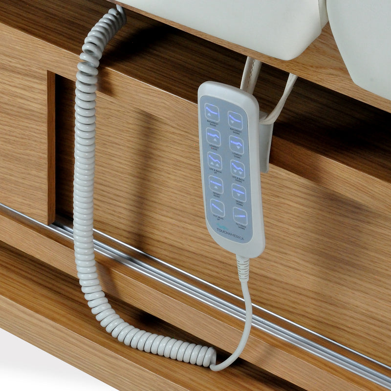 Handheld remote with coiled cord for the Touch America AIDA Treatment Table by TouchAmerica.