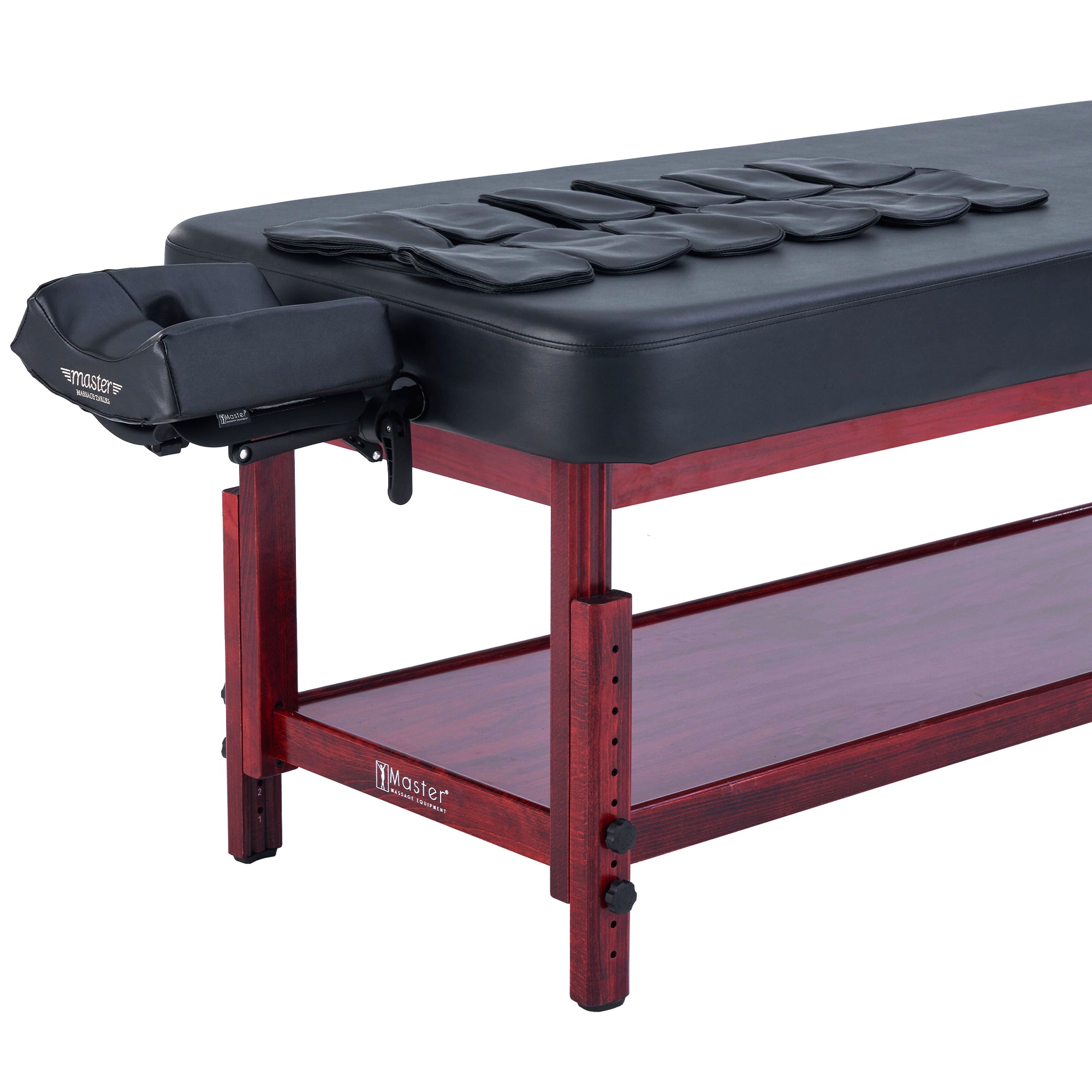 Master Massage AirMaster Table with face cradle, armrest, and padded accessories on top.