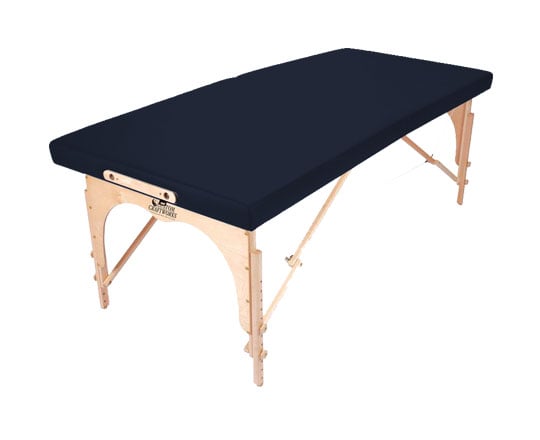 Custom Craftworks ALEXANDER TECHNIQUE portable table with black padding and light wooden legs.
