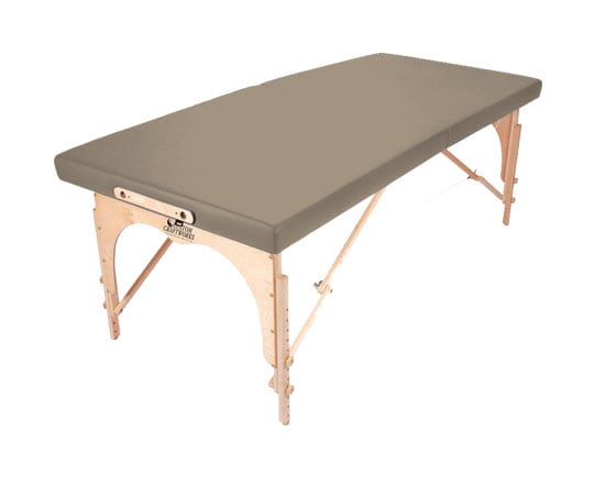 Custom Craftworks ALEXANDER TECHNIQUE Portable Table with padded gray top and birch legs, angled view.