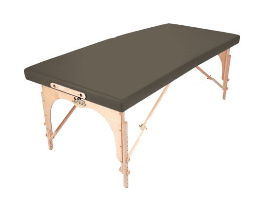 Custom Craftworks ALEXANDER TECHNIQUE table: black cushioned top, light wooden legs.