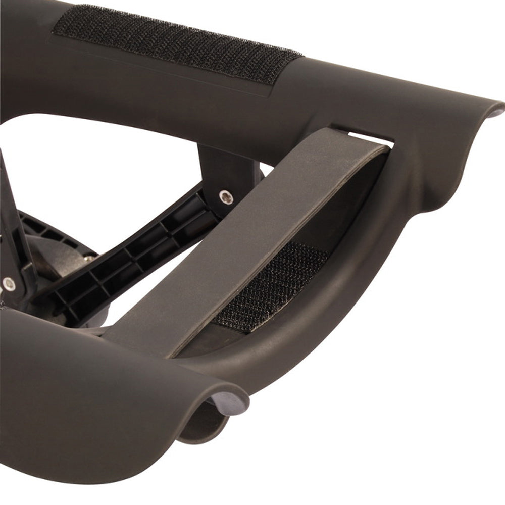 Close-up of MT Massage HARVEY TILT table by MT beside a black crutch.