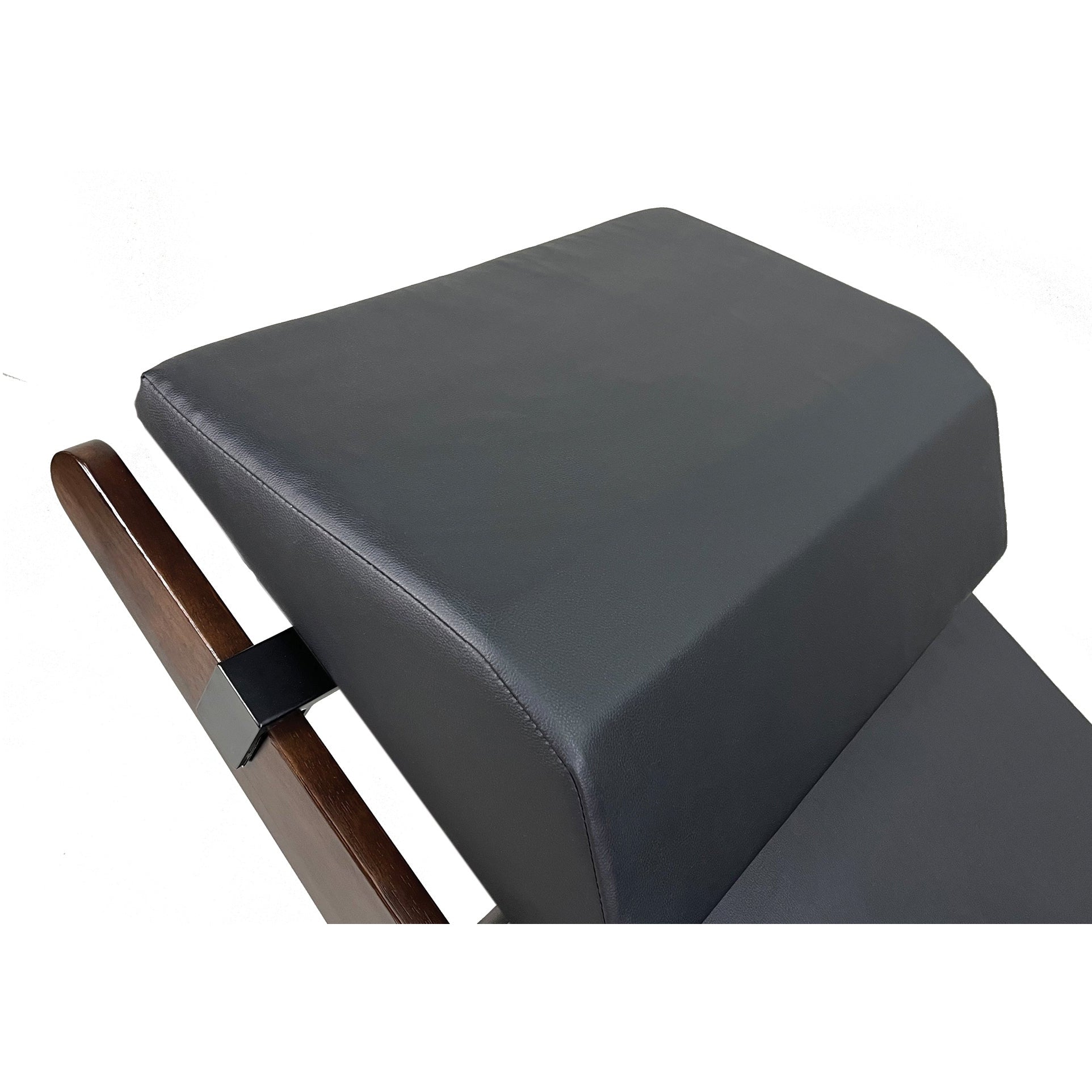 Close-up of TouchAmerica BREATH Pedi-Lounge’s black headrest on wooden spa chair.