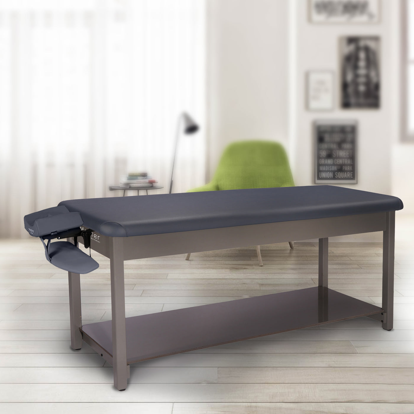 The Master Massage Bahama Stationary Table with face cradle is in a modern, softly lit room.
