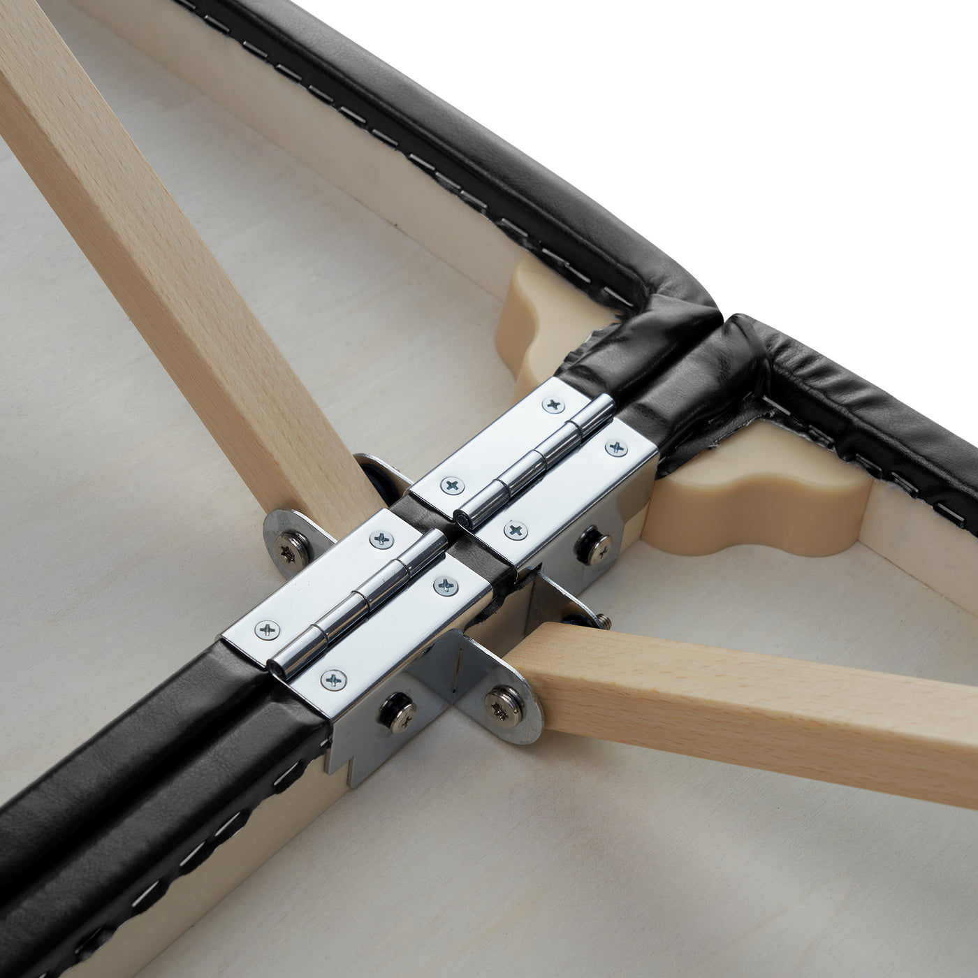 Close-up of hinge on Master Massage BALBOA Portable Massage Table with black and beige edges.