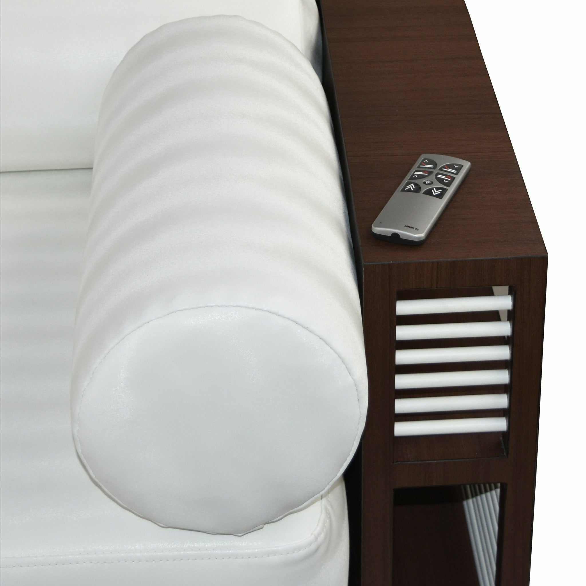 TouchAmerica MASQUERADE daybed's white cylindrical cushion with remote on armrest.