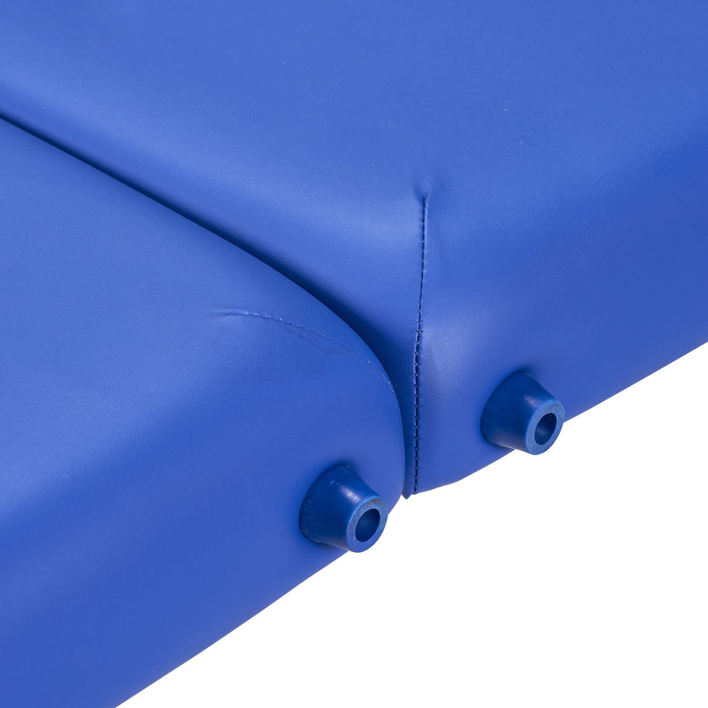 Close-up of two BRADY massage table cushion edges joined with plastic connectors by Master Massage.