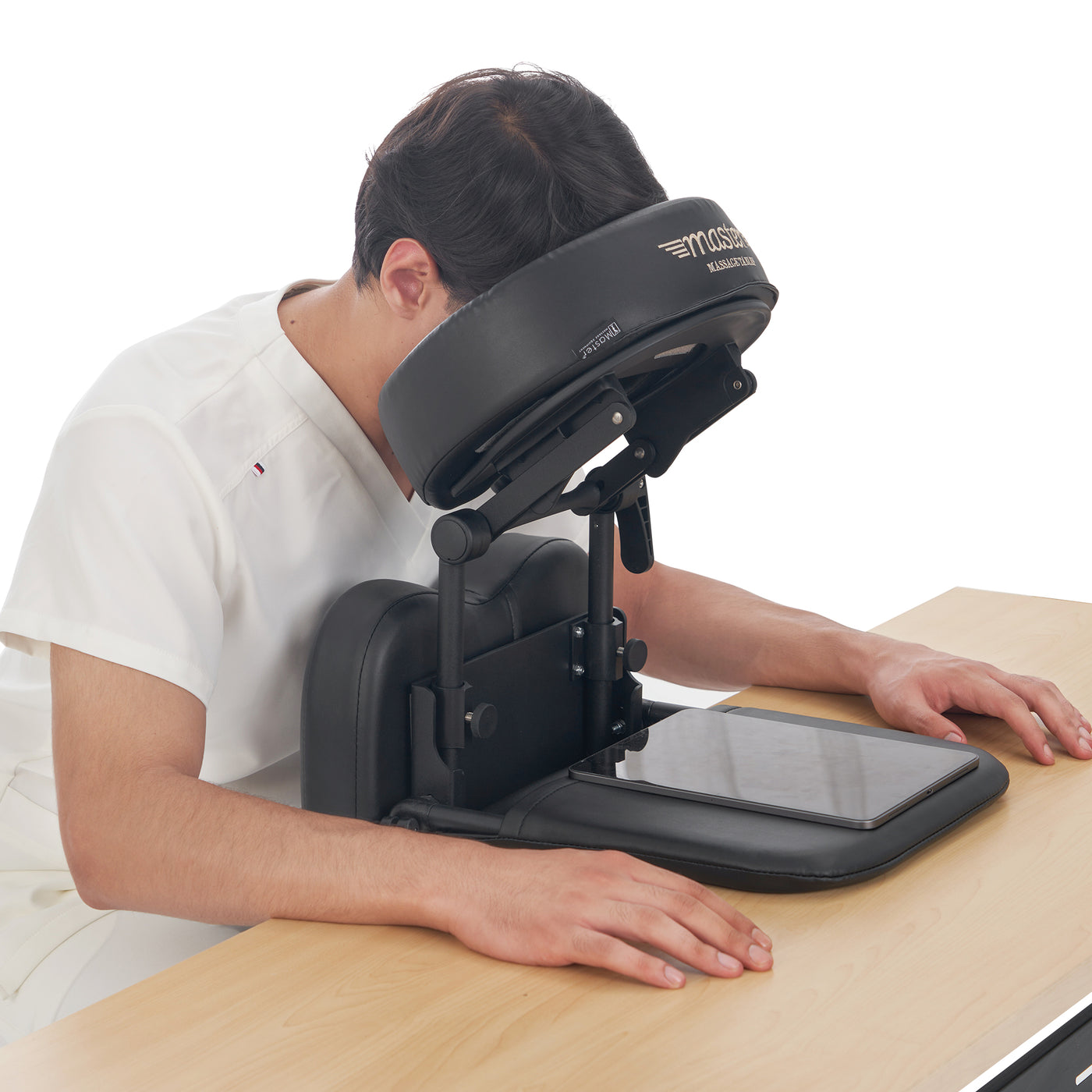 Person using a tablet on Master Massage - Pack-n-Go Massage Kit in Black