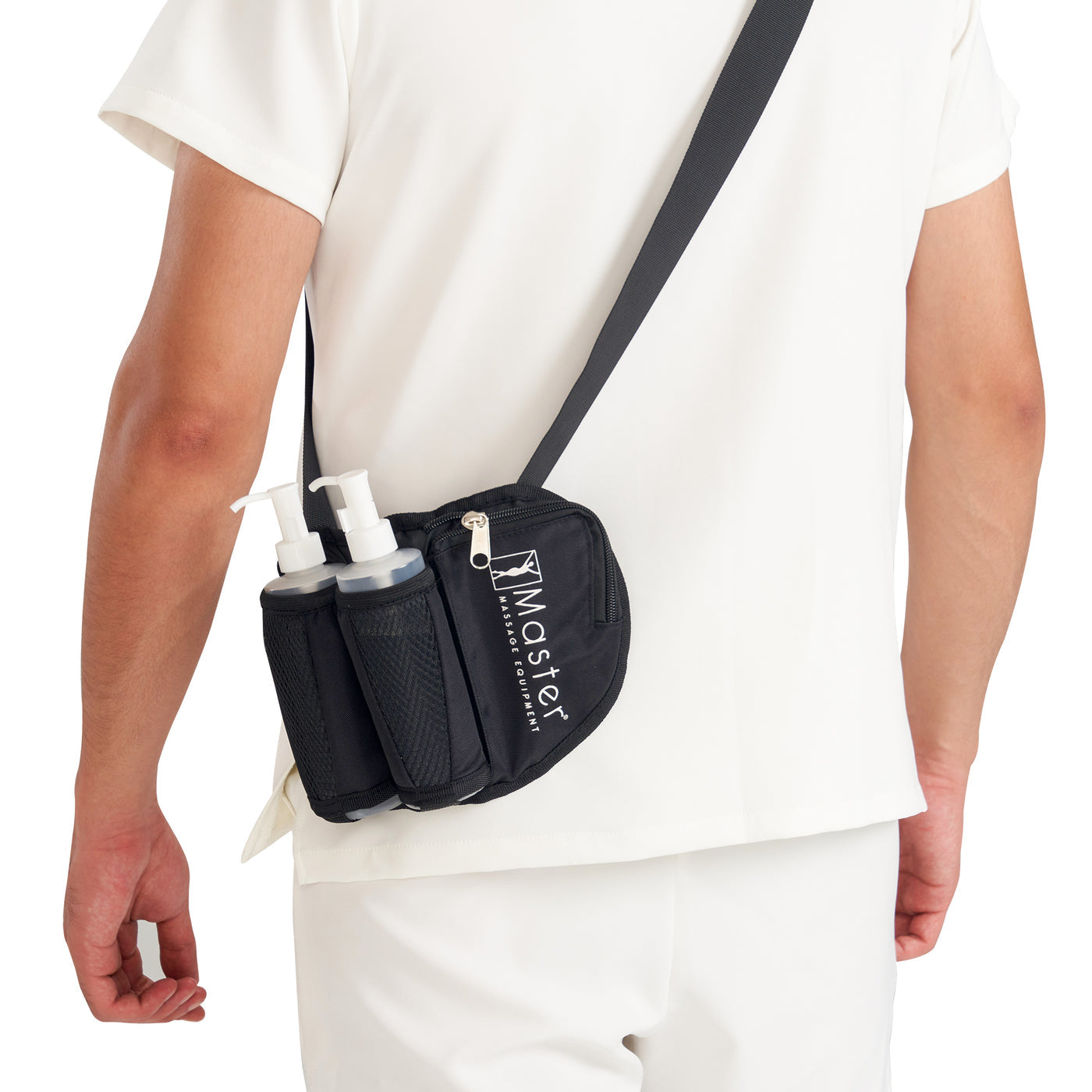 Person wearing a black waist bag with 'Master' branding on a white background