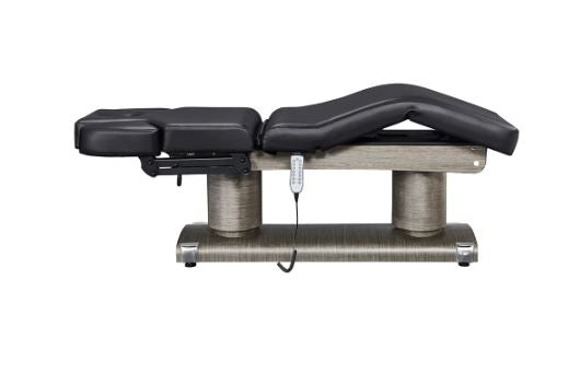 Luxi 4 Motors DIR adjustable black spa table with electric controls and wooden base, reclined.