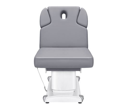 Luxi 4 Motors Medical Spa Table by DIR, gray with headrest and white base for treatments.