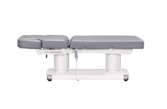 Luxi 4 Motors Medical Spa Treatment Table by DIR—gray, adjustable, remote-controlled.
