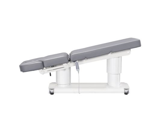 DIR Luxi 4 Motors spa table in gray/white with remote control, shown fully reclined.