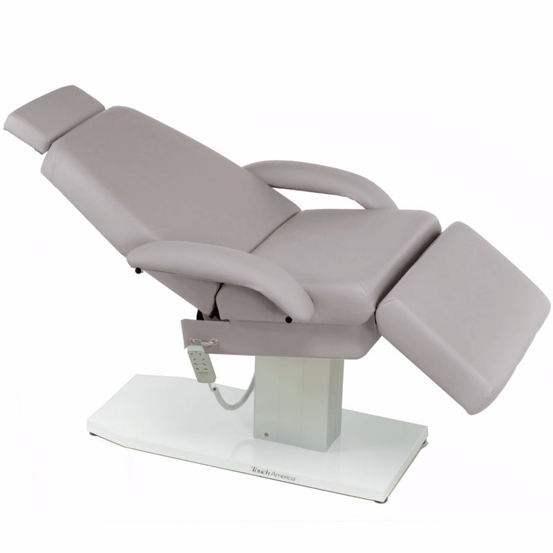 TouchAmerica EMPRESS Spa Treatment Chair: gray, adjustable incline, with armrests and footrest.