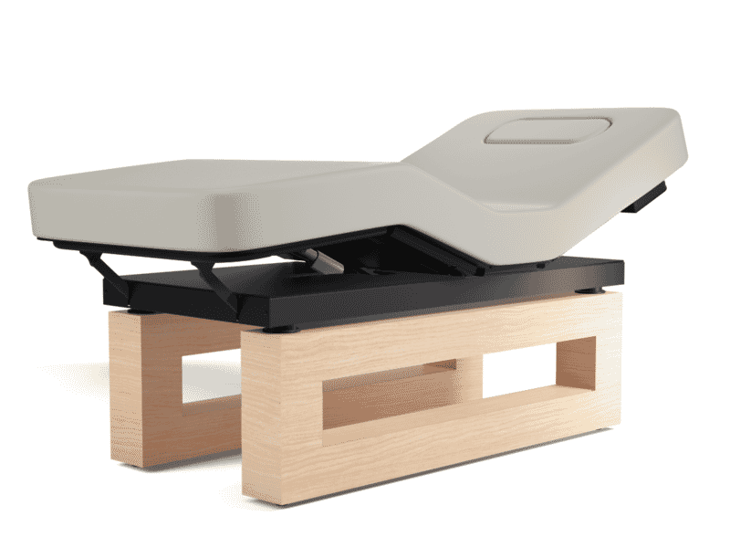 Oakworks Spa ICON Master's Collection Table features beige cushions, wood base, and optional vibroacoustic.