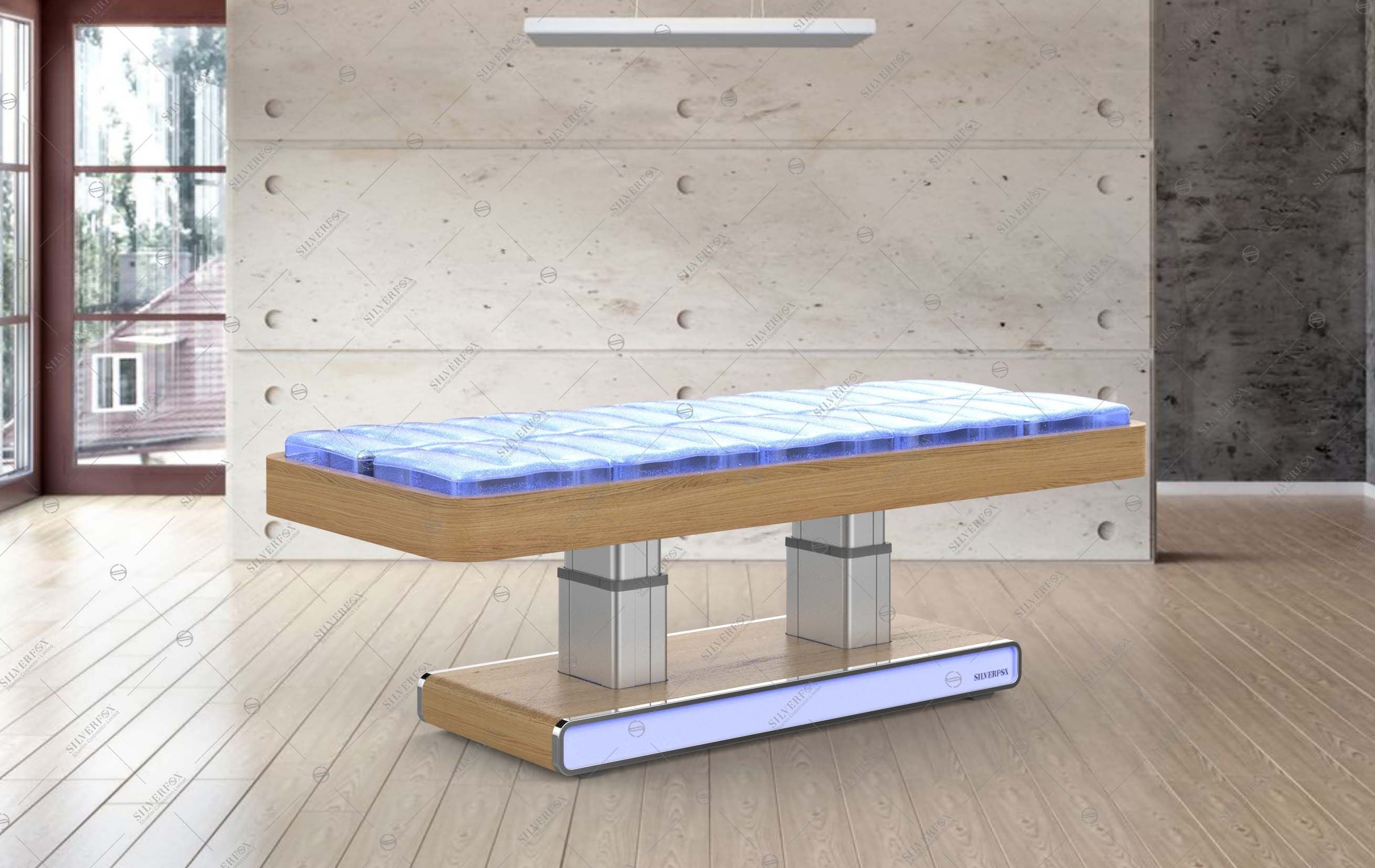 Silverfox America 2275 Electric Massage Table with blue padding in a bright, minimalist room.