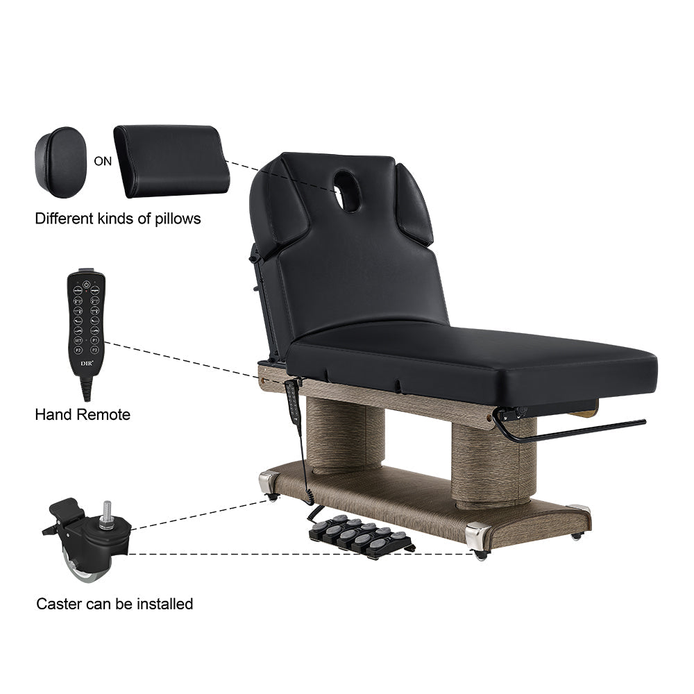 Black massage table with accessories on a white background