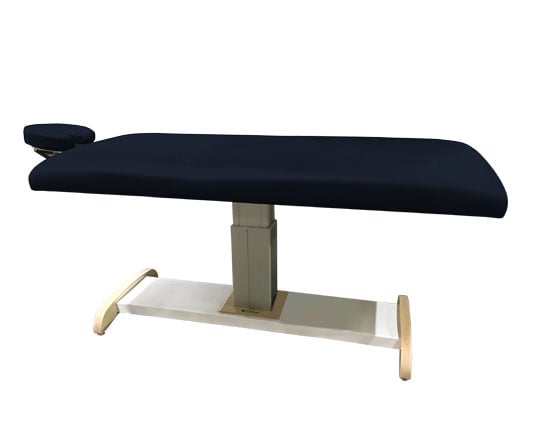 Elevated massage table with navy blue on a white background