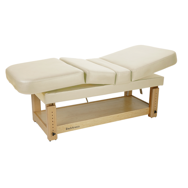 TouchAmerica STATIONARY MULTIPRO Table with cream padding and wooden frame.