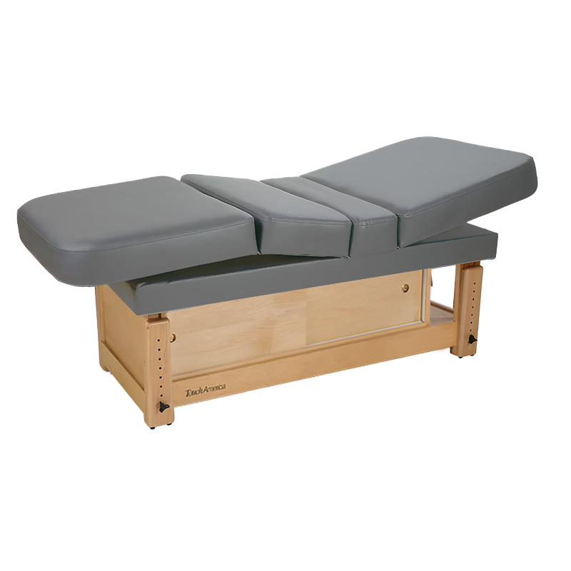 TouchAmerica STATIONARY MULTIPRO table: grey cushions, wooden base—ideal for spa massages.