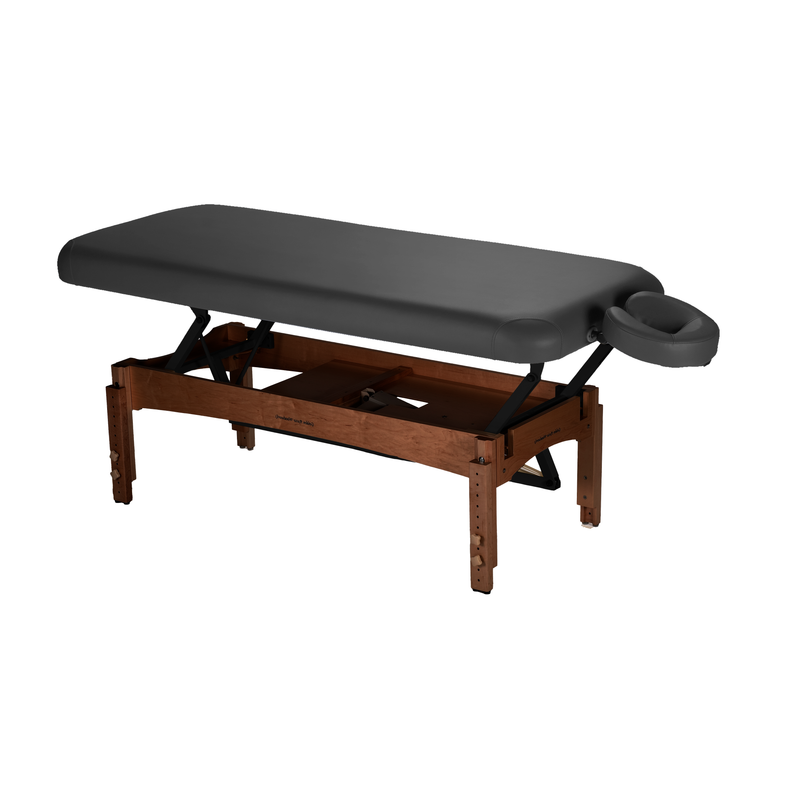 TouchAmerica OLYMPUS FLAT electric lift table with black padding and adjustable face cradle.