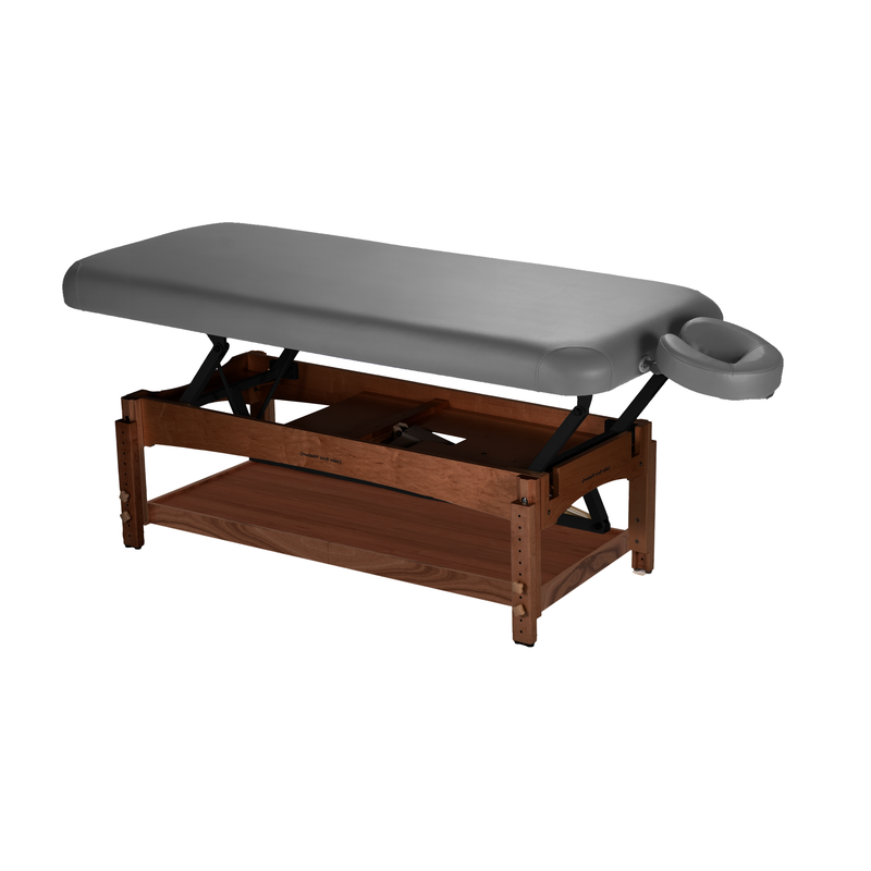 TouchAmerica OLYMPUS FLAT electric lift table with gray top, wood base, and face cradle.