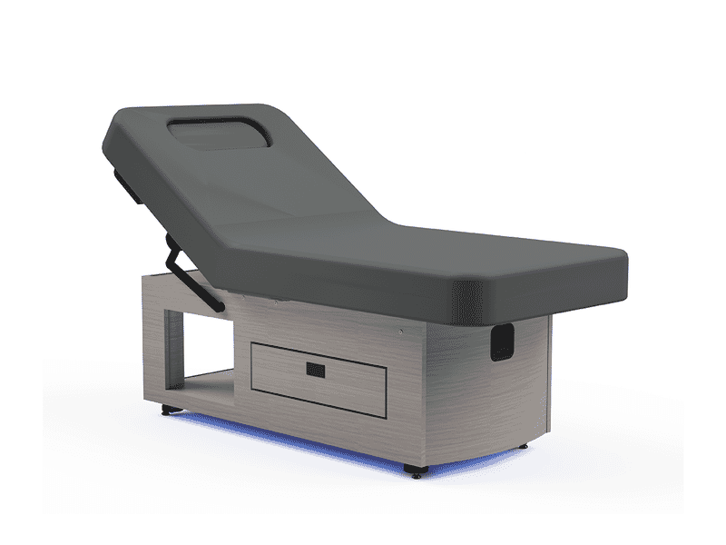 The Oakworks Prema E-nvi Backrest Top Electric Spa Table features a drawer and underlighting.