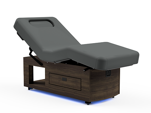 Oakworks Prema E-nvi electric spa table with gray top, dark wood base, and built-in drawer.