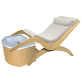 The TouchAmerica S Pedi Lounge is a padded wood lounger with an attached foot bath basin.