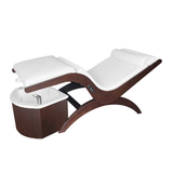 TouchAmerica S Pedi Lounge: white cushioned lounger with wood frame and footbath for spas.