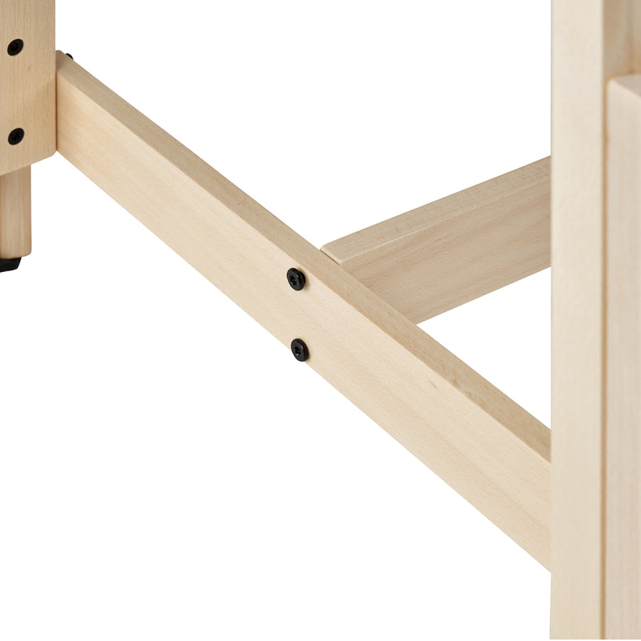 Close-up of MT Massage HARVEY Stationary Massage Table joint with black screws on light wood.