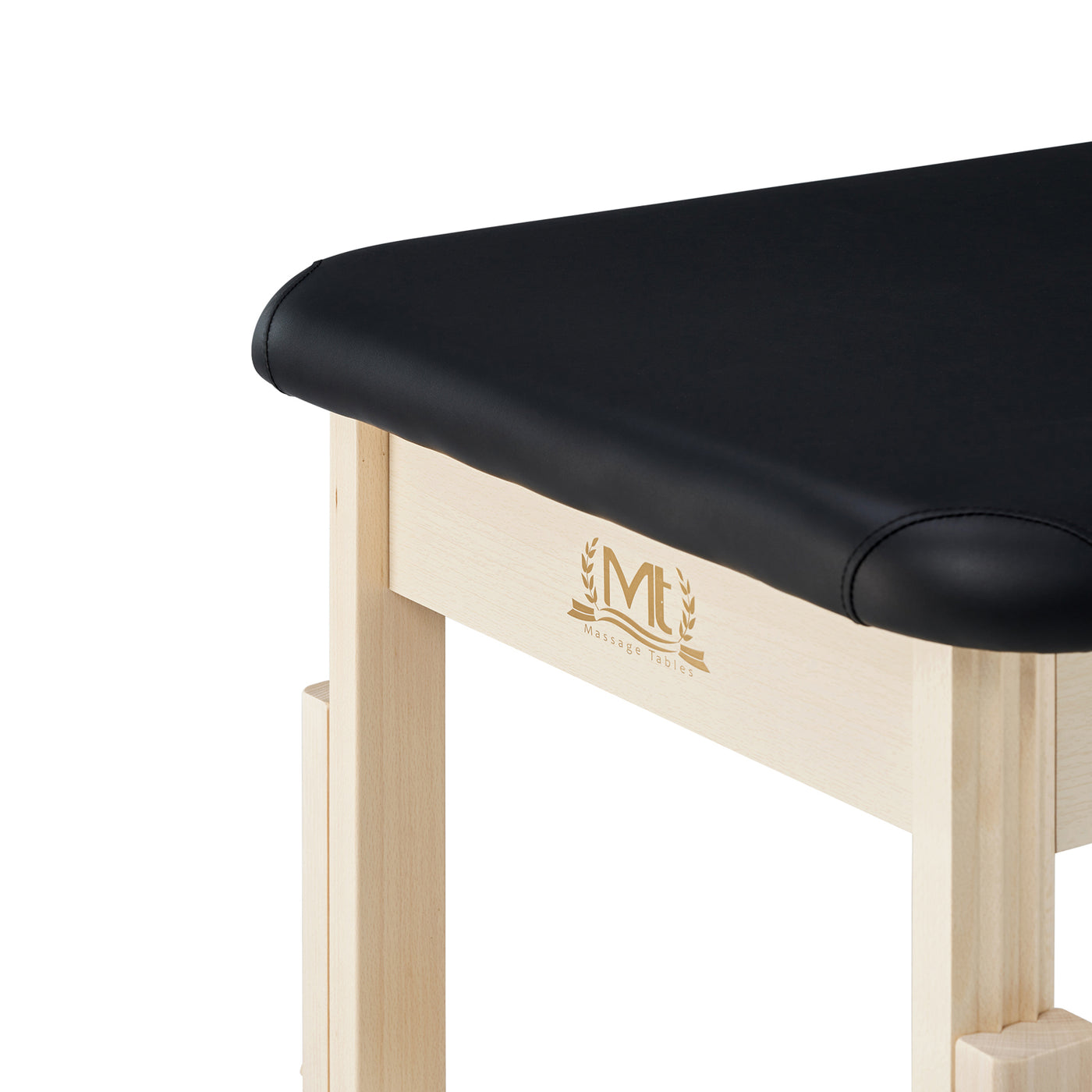 Corner of an MT Massage HARVEY Stationary Massage Table with oil- and water-resistant upholstery.