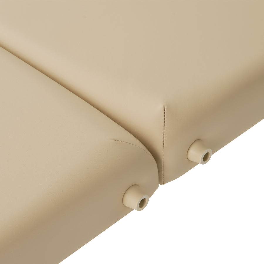 Close-up of the Master Massage ARGO Cream Portable Table with beige padding and plastic connectors.