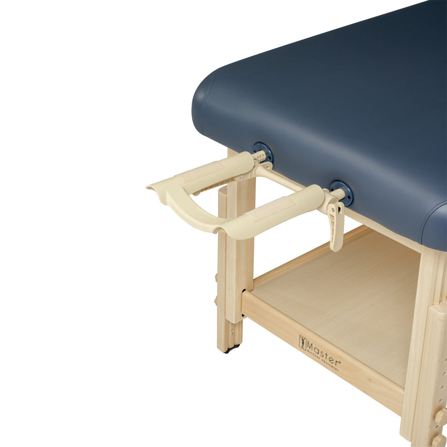 Close-up of Master Massage LAGUNA Stationary Table with cream accessory under tabletop.