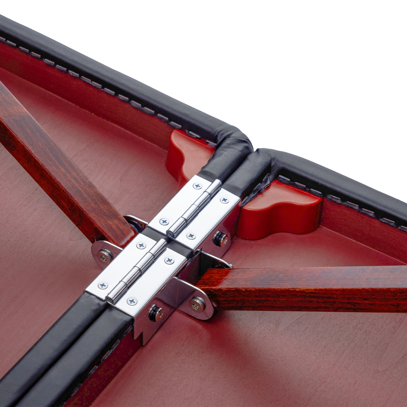 Close-up of metal hinges on the Master Massage MONTCLAIR Portable Massage Table, black/red trim.