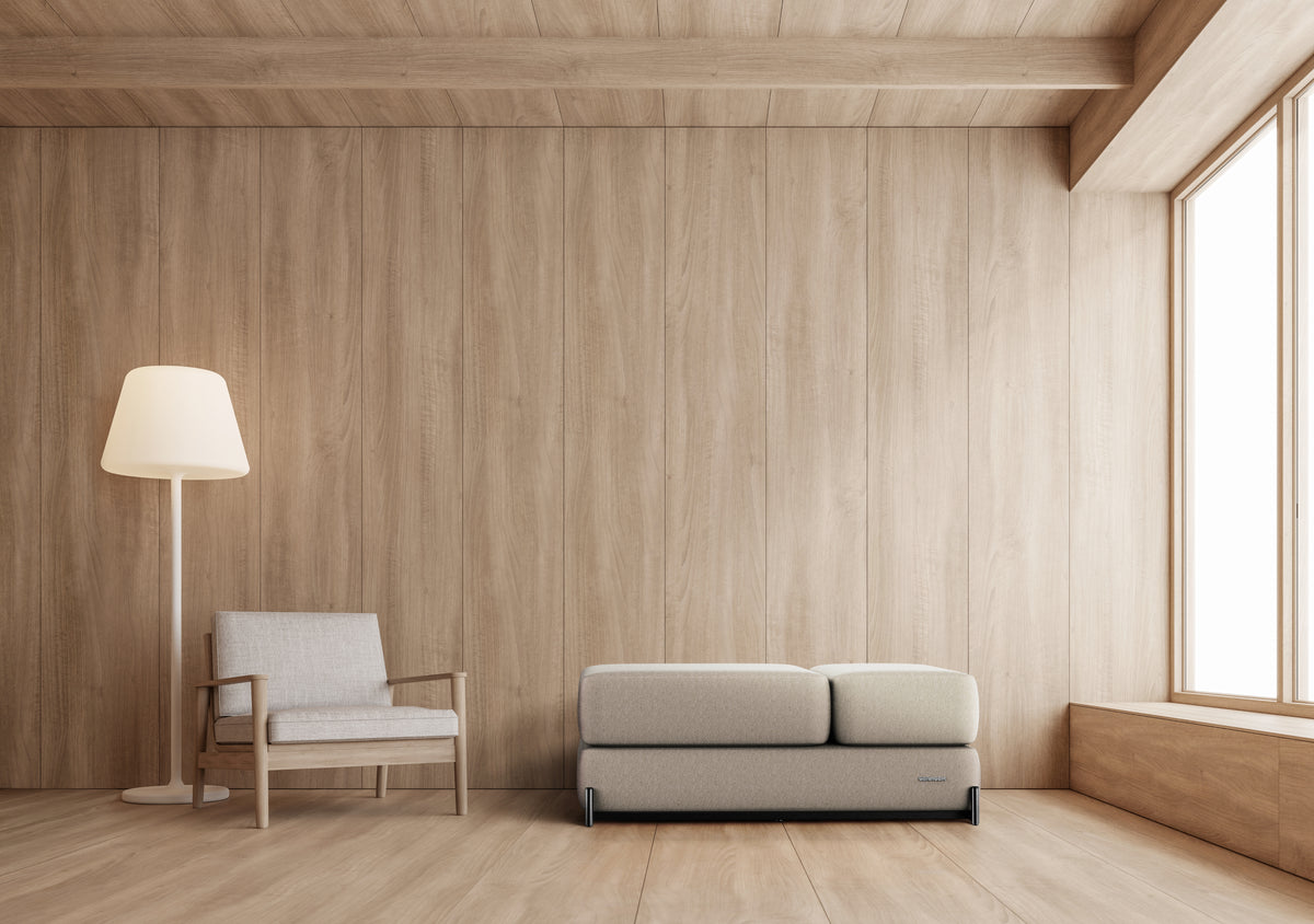 Modern living room with wooden walls, a floor lamp, and Ceragem S4 Massage Lounger.