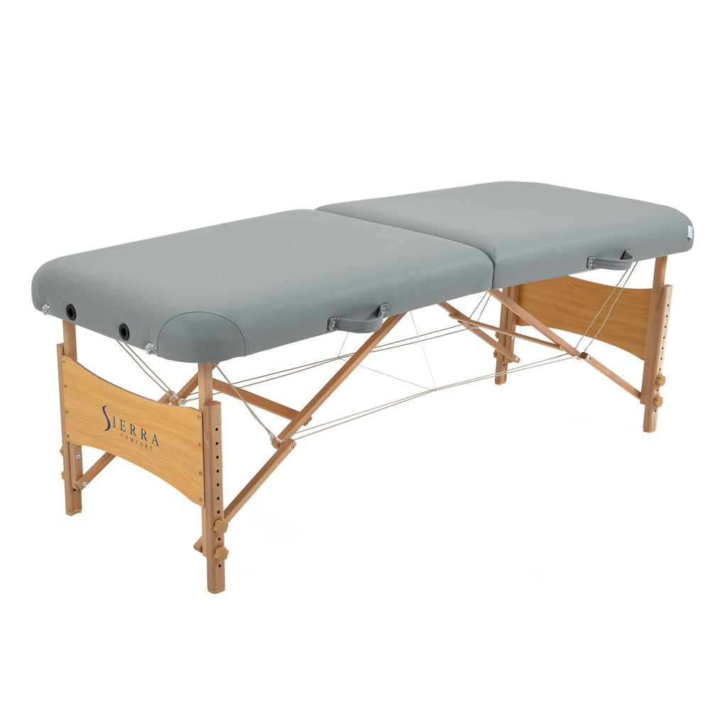 Sierra Comfort Premium Wide Portable Massage Table with adjustable height and wooden legs.