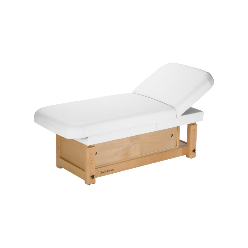 The TouchAmerica STATIONARY FACE & BODY Treatment Table features a cushioned, adjustable white top.