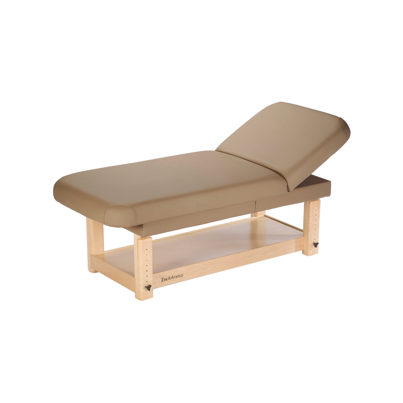 TouchAmerica STATIONARY FACE & BODY Table with padded top and raised headrest for comfort.