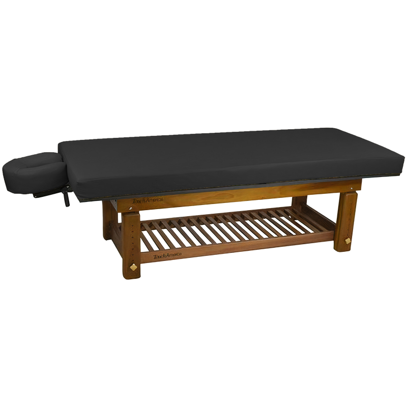 The TouchAmerica SOLTERRA Teak Table features a black padded cushion and attached face cradle.