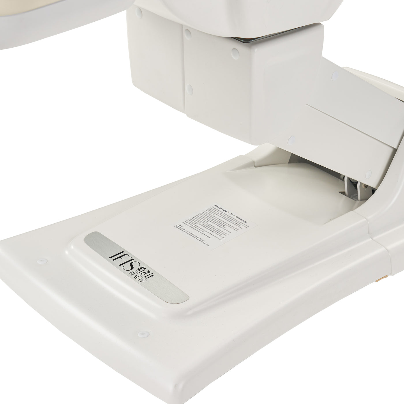 Close-up of Master Massage Sonora Beauty Bed base near white medical scale with instruction and IFS labels.