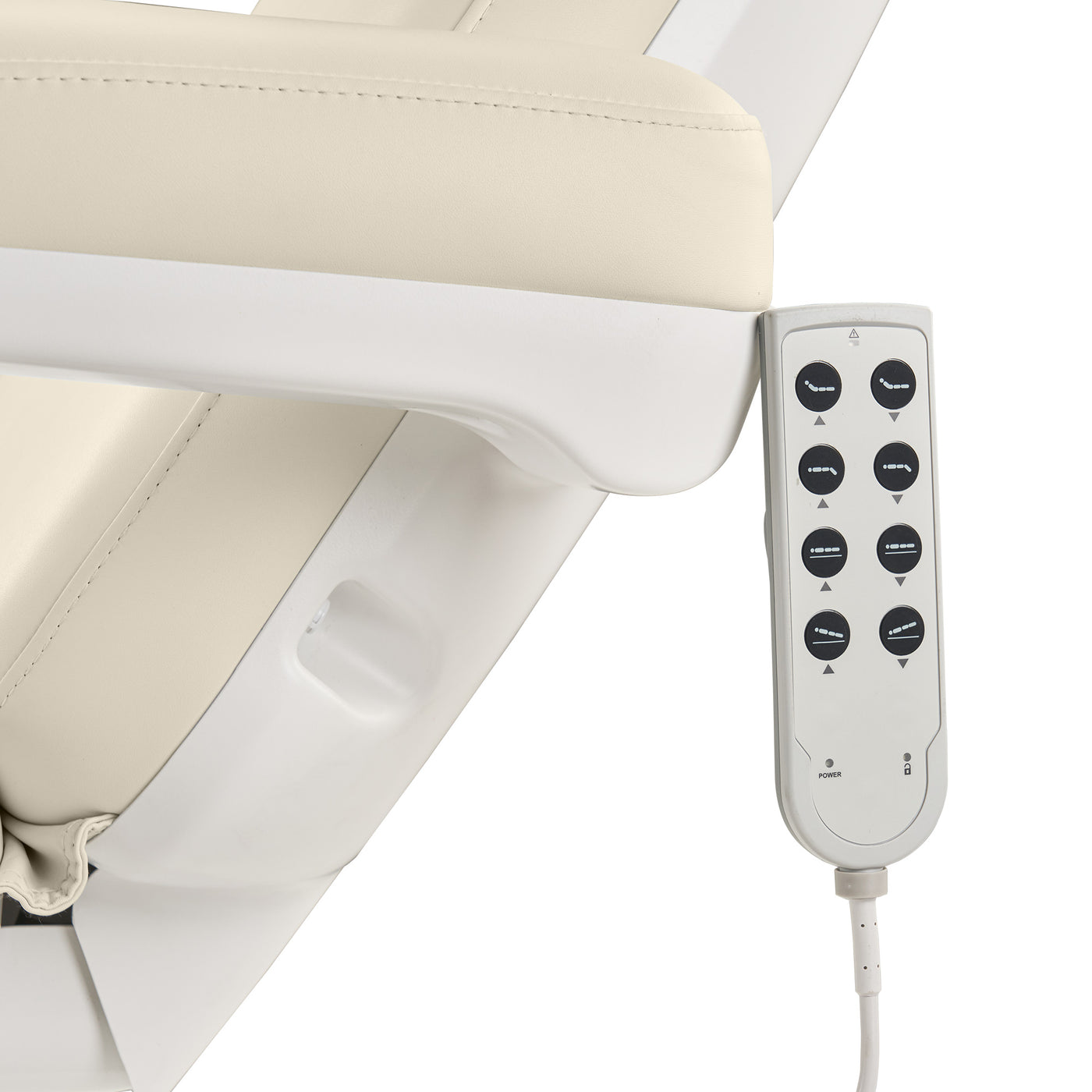 Close-up of Master Massage Sonora Beauty Bed's white armrest with attached remote control.