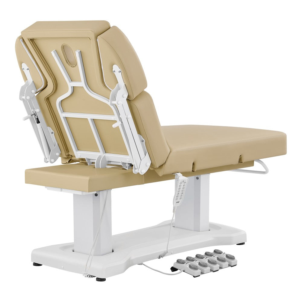 Beige and white adjustable medical examination table on a white background