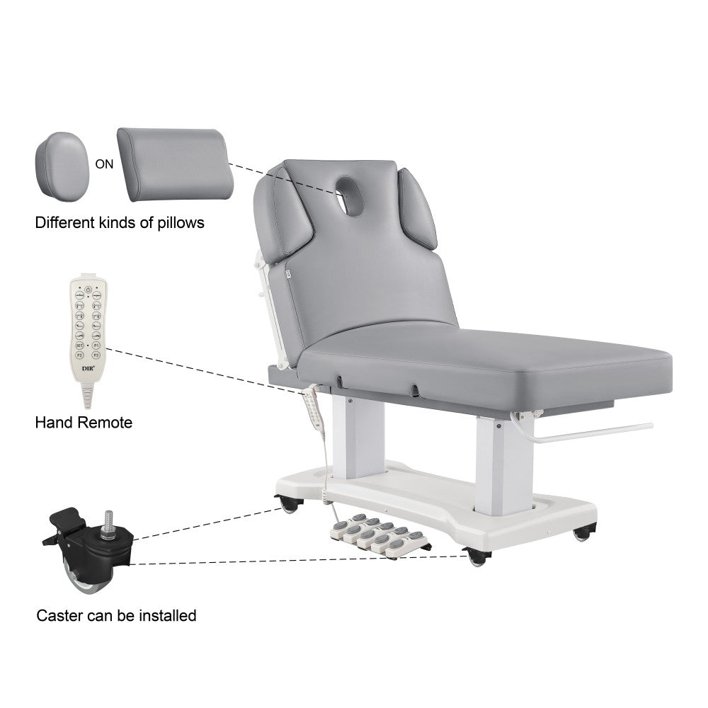 Gray medical examination table with various components labeled on a white background