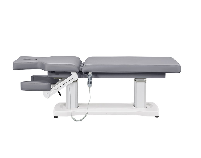 DIR Tranquility 4 Motors gray electric spa table with padded surface and electronic controls.