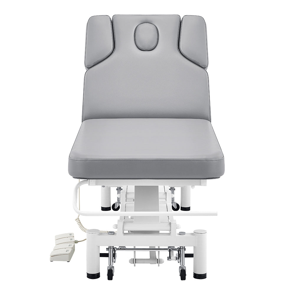 A gray DIR VitalEarth Spa Wellness Therapy Bed with remote controls, viewed from the front.