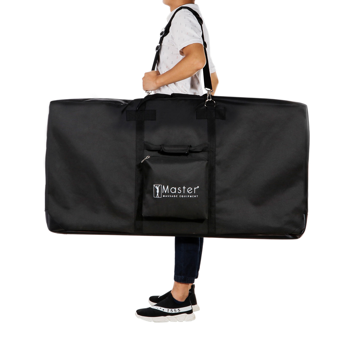 Person carrying a Master Massage MARS SPORT Portable Table in a large black Master Massage bag.
