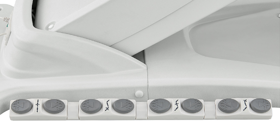 Close-up of Apollo II Electric Beauty Bed by DIR: control panel with 8 buttons and hinged lid above.